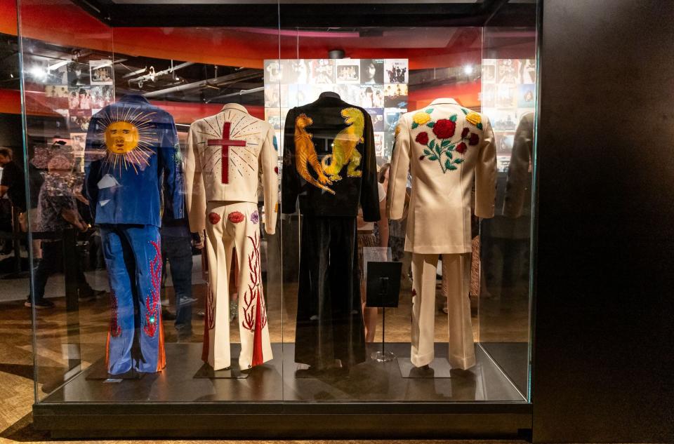 A long-lost suit worn by Flying Burrito Brothers member Chris Ethridge (far right) joined the a previously-unveiled collection at the Country Music Hall of Fame and Museum on July 20, 2023.