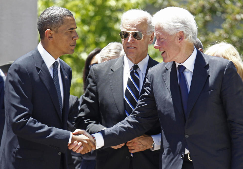 Barack Obama, Joe Biden, Bill Clinton (Charles Dharapak / AP file)