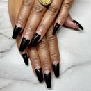 This eye-catching take on the half moon delivers all the drama of an iconic black mani but with an unexpected twist.