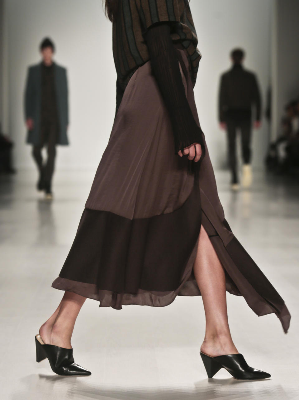 Fashion from the Richard Chai Love Fall 2014 collection is modeled, during New York Fashion Week on Thursday Feb. 6, 2014. (AP Photo/Bebeto Matthews)