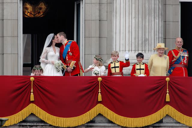 <p>Paul Cunningham/Corbis via Getty </p> Queen Elizabeth wears yellow at Prince William and Princess Kate's wedding in 2011