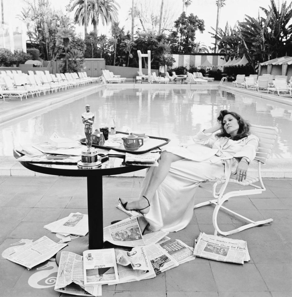 <p>Actress Faye Dunaway takes it easy by the pool at the Beverly Hills Hotel the morning after she received the 1976 Best Actress Academy Award for her role in Network. </p>