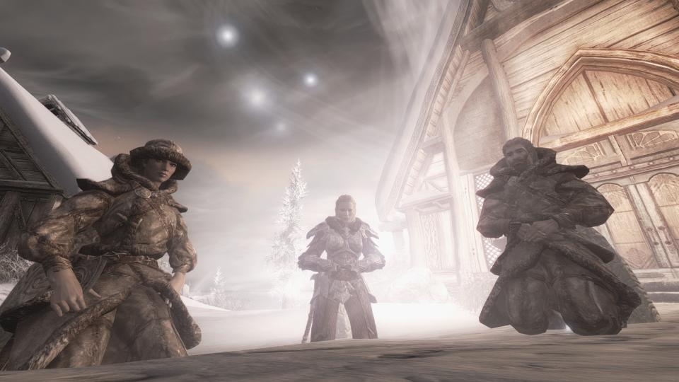 Best Skyrim mods - three characters kneel in prayer.