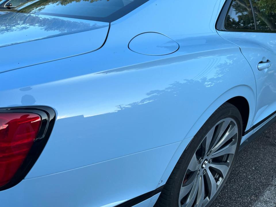 Crisp  lines in the aluminum body panels of the 2022 Bentley Flying Spur plug-in hybrid