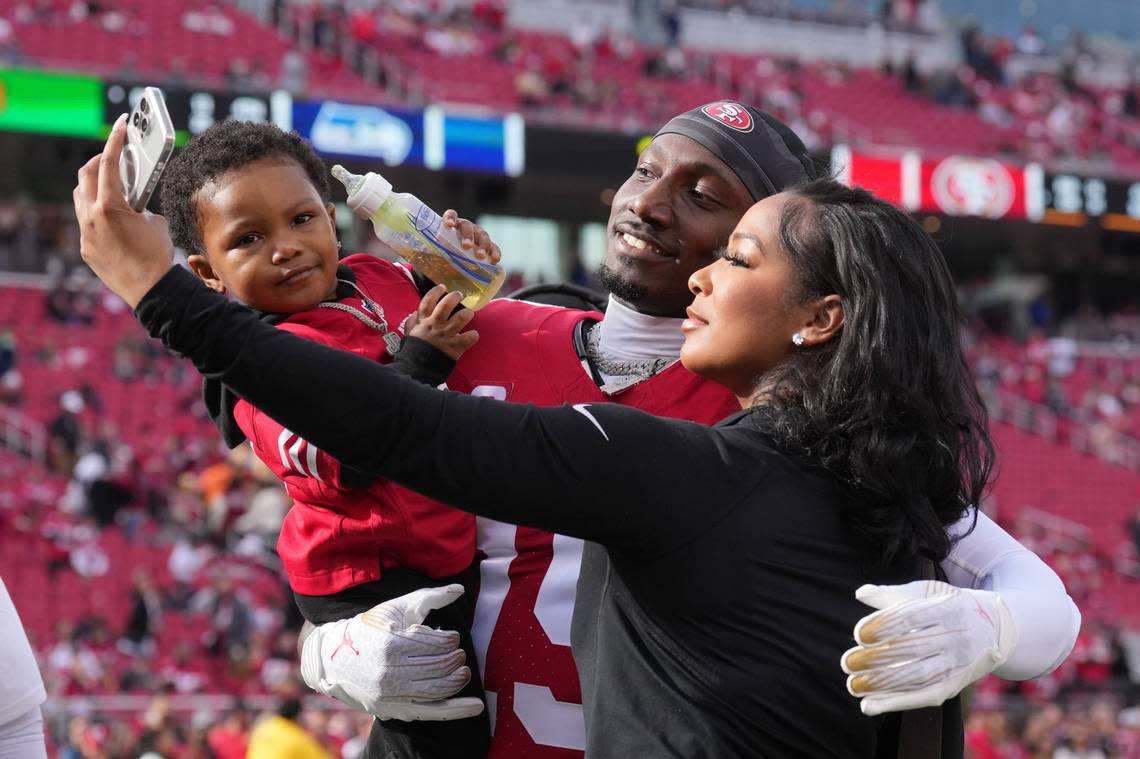 San Francisco 49ers wide receiver Deebo Samuel takes a selfie with his son, Tyshun, and girlfriend, Mahogany Jones, before the Seattle Seahawks game in December.