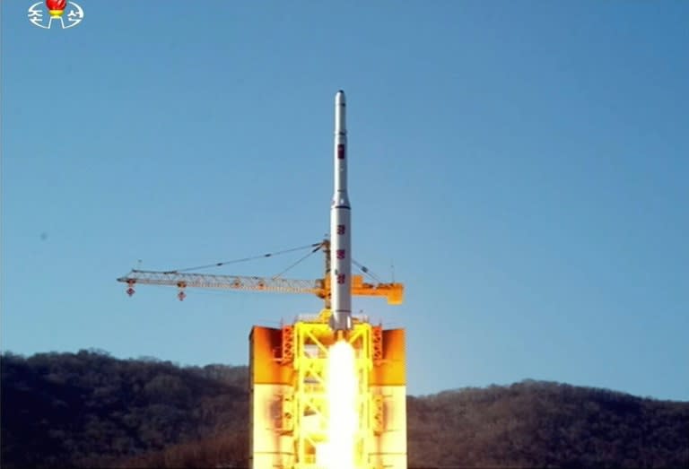 This picture taken from North Korean TV and released by South Korean news agency Yonhap on February 7, 2016 shows North Korea's locket launch of earth observation satellite Kwangmyong 4