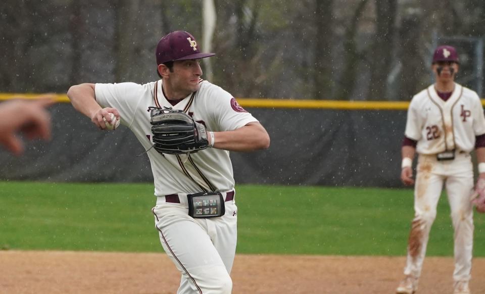 Iona Prep third baseman Tim Denet (17) makes a throw to first during their 6-2 win over Fordham Prep in baseball action at Iona Prep High School in New Rochelle on Wednesday, April 17, 2024.