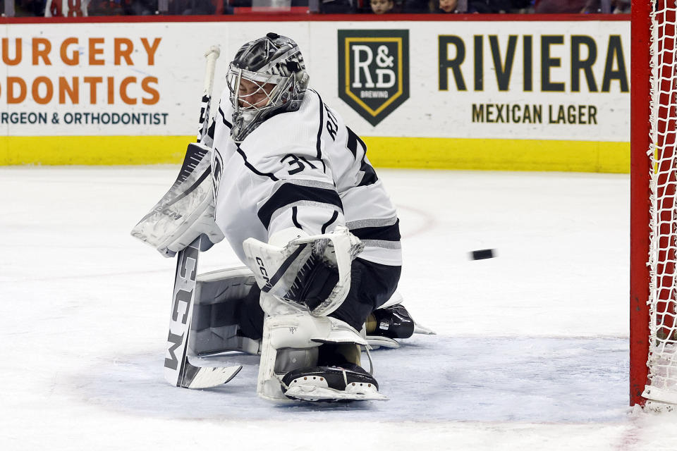 Los Angeles Kings goaltender David Rittich (31) fails to stop a shot by Carolina Hurricanes' Jordan Martinook for a goal during the second period of an NHL hockey game in Raleigh, N.C., Monday, Jan. 15, 2024. (AP Photo/Karl B DeBlaker)