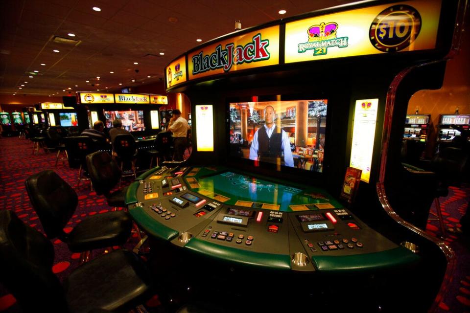 In this Nov. 9, 2011 photo, Black Jack machines are shown at the Magic City Casino in Miami. Miami has been hit hard by the recession and the collapse of Florida's real estate market. There are nearly 300,000 people out of work in the area. That's led many to envision a plan for boosting jobs: Casinos. Big Ones. (AP Photo/Wilfredo Lee)