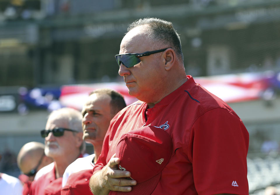 Los Angeles Angels manager Mike Scioscia, stands for the national anthem before a baseball game between the Angels and the Oakland Athletics in Anaheim, Calif., Sunday, Sept. 30, 2018. It is expected that this will be Scioscia's last game as manager of the Angels. (AP Photo/Reed Saxon)