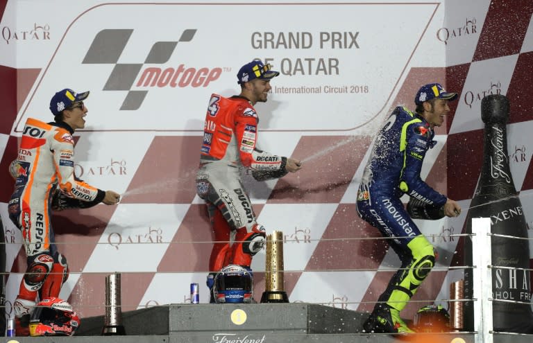 Walk this way: Marc Marquez, race winner Andrea Dovizioso and Valentino Rossi at the Qatar MotoGP