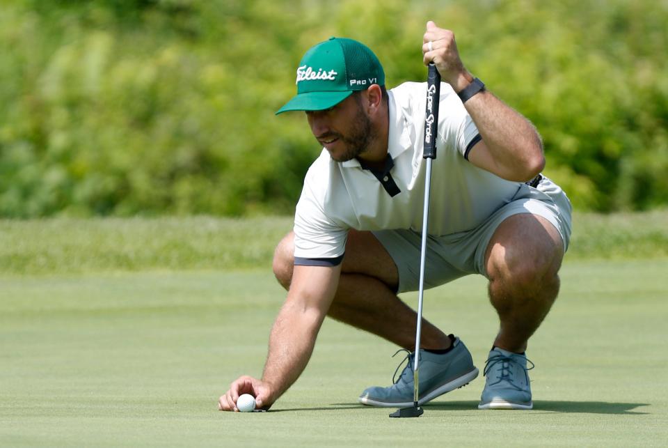 Austin Conroy prepares to putt during the Men’s City Golf Tournament, Sunday, July 23, 2023, at Birck Boilermaker Golf Complex in West Lafayette, Ind.