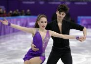 <p>Adel Tankova and Ronald Zilberberg, of Israel perform during the ice dance short dance team event in the Gangneung Ice Arena at the 2018 Winter Olympics in Gangneung, South Korea, Sunday, Feb. 11, 2018. (AP Photo/Julie Jacobson) </p>