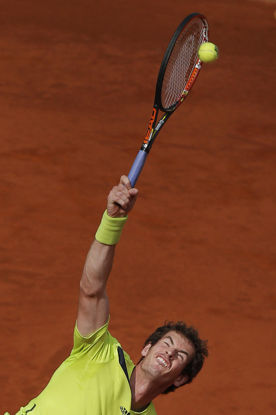 Andy Murray from Britain serves during a Madrid Open tennis tournament match against Santiago Giraldo from Colombia in Madrid, Spain, Thursday, May 8, 2014. (AP Photo/Andres Kudacki)