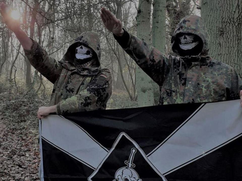 Two UK members of Feuerkrieg Division in a picture posted in an online chat: Eugene Antifa