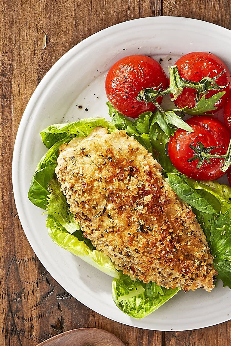 <p>The secret behind this flavorful recipe? A smear of Dijon mustard on each chicken breast!</p><p><strong><a href="https://www.countryliving.com/food-drinks/recipes/a44271/roasted-parmesan-chicken-tomatoes-recipe/" rel="nofollow noopener" target="_blank" data-ylk="slk:Get the recipe;elm:context_link;itc:0;sec:content-canvas" class="link ">Get the recipe</a>.</strong></p><p><strong><a class="link " href="https://www.amazon.com/Nordic-Ware-Natural-Aluminum-Commercial/dp/B0049C2S32?tag=syn-yahoo-20&ascsubtag=%5Bartid%7C10063.g.35055779%5Bsrc%7Cyahoo-us" rel="nofollow noopener" target="_blank" data-ylk="slk:SHOP BAKING SHEETS;elm:context_link;itc:0;sec:content-canvas">SHOP BAKING SHEETS</a><br></strong></p>