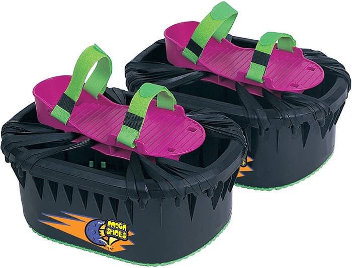 a pair of black and purple moon shoes