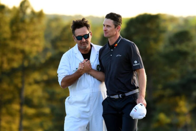 Justin Rose and caddie Mark Fulcher try to shake off a Masters loss. (Getty)