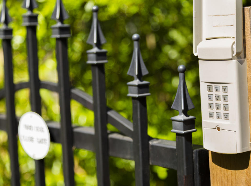 gate with a code box next to it