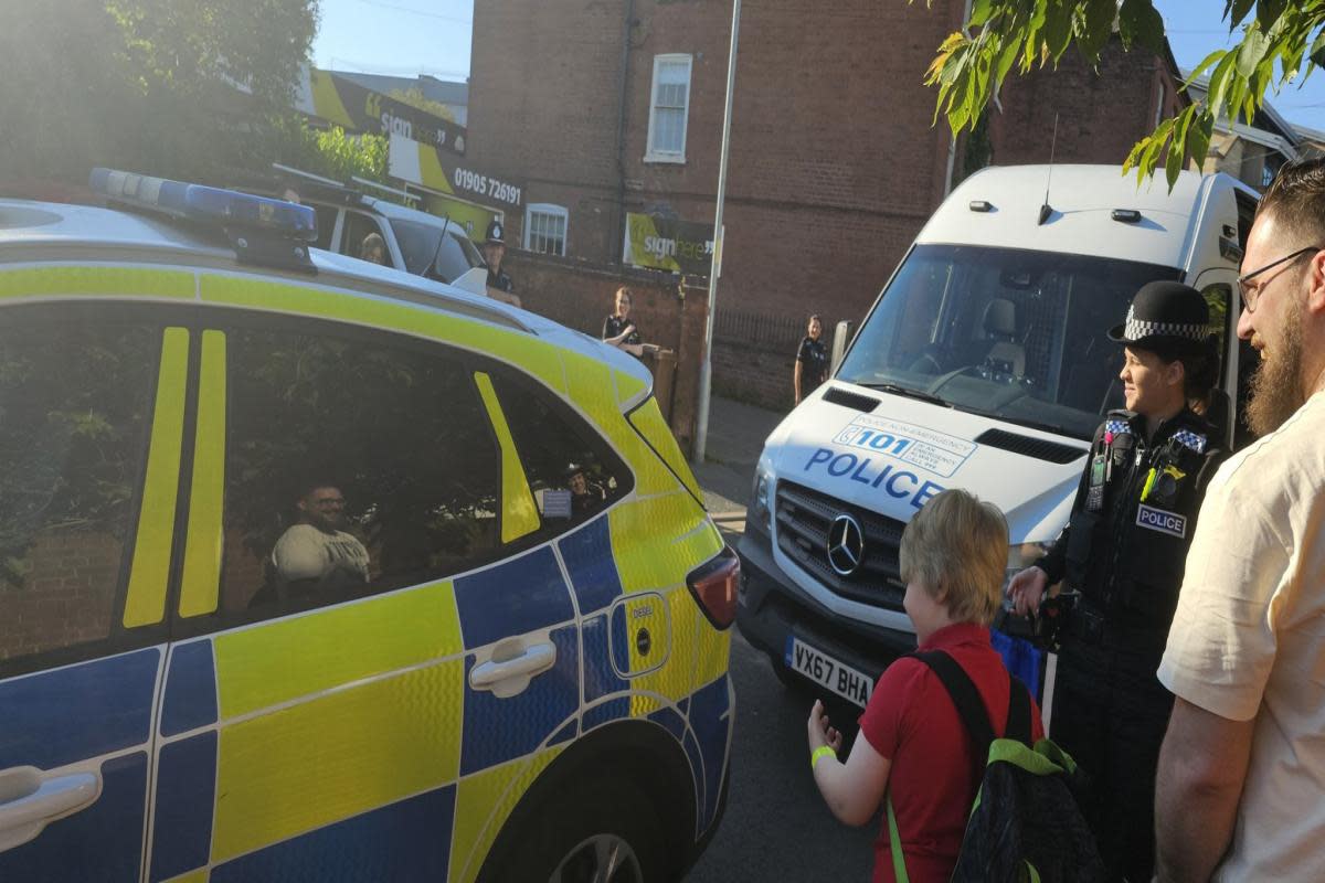 CELEBRATIONS: Jayden excitedly prepares to go to school with police officers on his ninth birthday <i>(Image: Chris)</i>