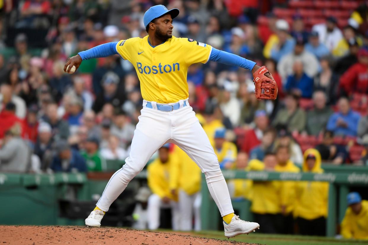 Boston Red Sox third baseman Pablo Reyes (19) pitches during the ninth inning against the Chicago Cubs on April 27, 2024, at Fenway Park.