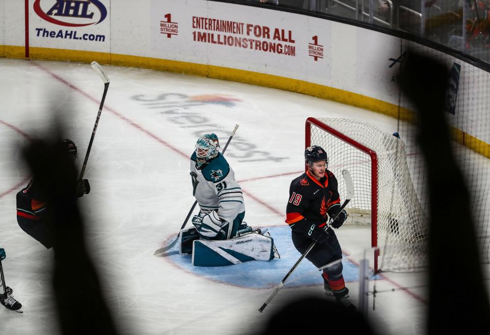 Cameron Hughes, 19 celebrates a goal for the Coachella Valley Firebirds during their game against the San Jose Barracuda at Acrisure Arena in Palm Desert, Calif., Feb. 28, 2024.