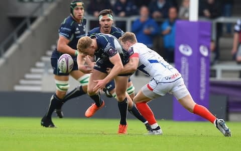 Chris Ashton knocks the ball out of Colm DeBuitlear's hands - Credit: getty images