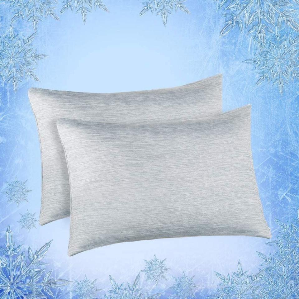 It features one side designed in a state-of-the-art Japanese cooling fabric and the other side in 100% breathable cotton &mdash; basically, you'll always know which is the cool side of the pillow.<br /><br /><strong>Promising review:</strong> "Best...Pillowcases...Ever!! I run hot all the time, especially at night. This really helps to keep me cool at night. I fall asleep, stay asleep, and wake up refreshed. The cool side of the pillow is always your side of the pillow! I actually sometimes get cold during the night. If you wake up in the middle of the night sweating, you need to get this!" &mdash; <a href="https://www.amazon.com/gp/customer-reviews/RW2WYT4L95JW5?&amp;linkCode=ll2&amp;tag=huffpost-bfsyndication-20&amp;linkId=ef9dae48a493a8ffe38aa9adf6904904&amp;language=en_US&amp;ref_=as_li_ss_tl" target="_blank" rel="noopener noreferrer">Kim</a><br /><br /><strong><a href="https://www.amazon.com/Elegear-Cooling-Pillowcases-Japanese-Breathable/dp/B07TMF54XC?th=1&amp;linkCode=ll1&amp;tag=huffpost-bfsyndication-20&amp;linkId=0f63ce0af0df19ff85fa5c985420d4b3&amp;language=en_US&amp;ref_=as_li_ss_tl" target="_blank" rel="noopener noreferrer">Get a set of two from Amazon for $25.89+ (available in two sizes and seven colors).</a></strong>