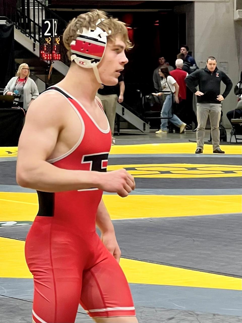 Pleasant's Daxton Chase gets ready for his 150-pound bout in Division III during the state wrestling tournament Friday at Ohio State's Schottenstein Center.