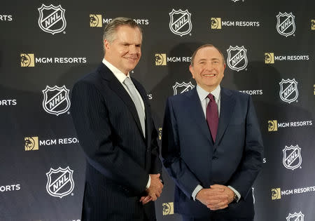 MGM Resorts International CEO James Murren (L) and National Hockey League Commissioner Gary Bettman stand during a news conference announcing their official sports betting partnership in New York City, New York, U.S., October 29, 2018. REUTERS/ Hilary Russ