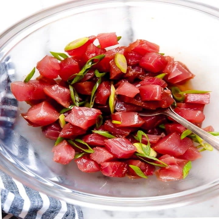 Chunks of raw ahi tuna marinated in soy sauce.