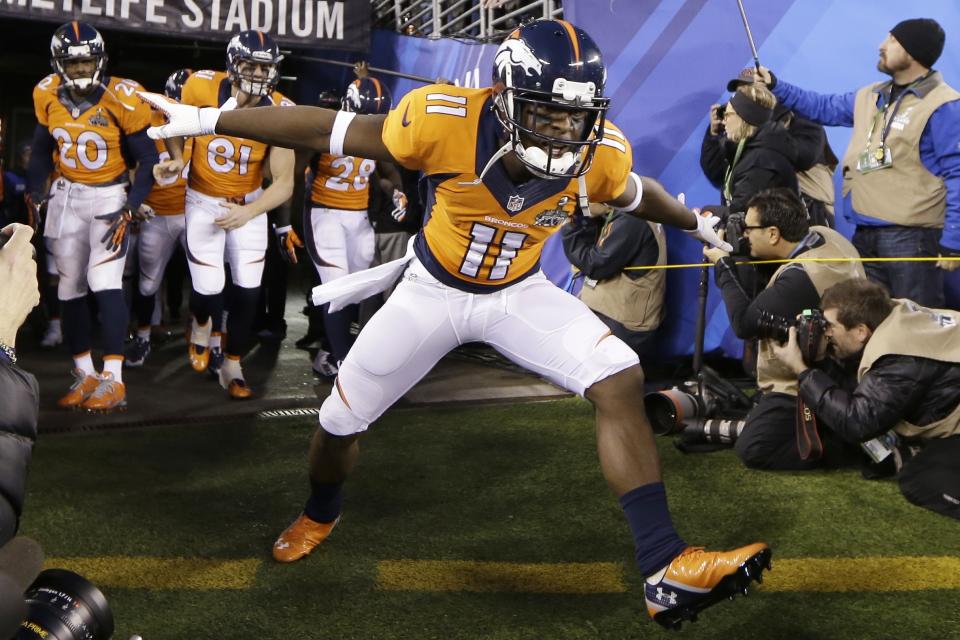 Denver Broncos' Trindon Holliday spreads his arms as runs on the field before the NFL Super Bowl XLVIII football game against the Seattle Seahawks on Sunday, Feb. 2, 2014, in East Rutherford, N.J. (AP Photo/Mark Humphrey)