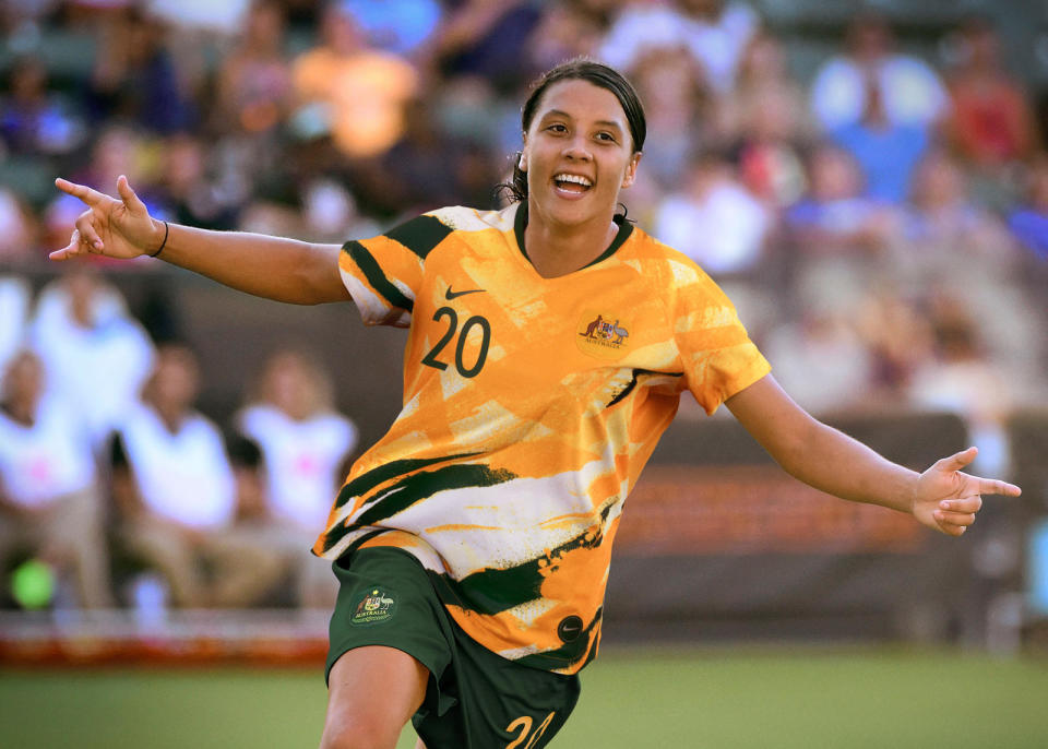 <p>Sam Kerr dons the new Matildas home kit – which is a throwback to the Socceroos of the 90s. </p>