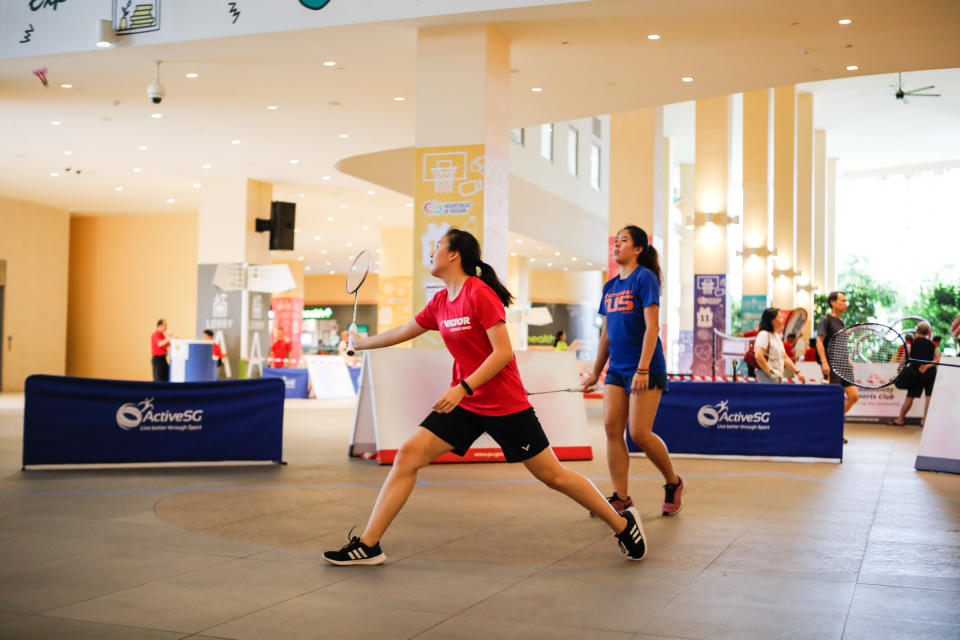 Members of the public trying out AirBadminton at HeartBeat@Bedok. (PHOTO: Singapore Badminton Association)