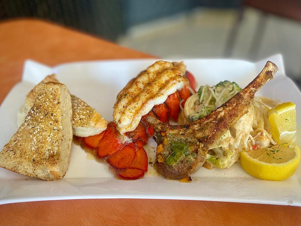 Grilled lobster tail, lamb chop and alfredo from Sauté Kingz by Chef Count in Daytona Beach.