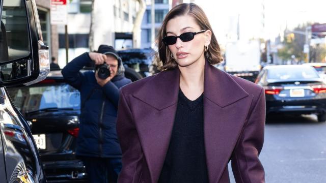 The Newest Way to Wear Your Coat Is to Barely Wear it at All