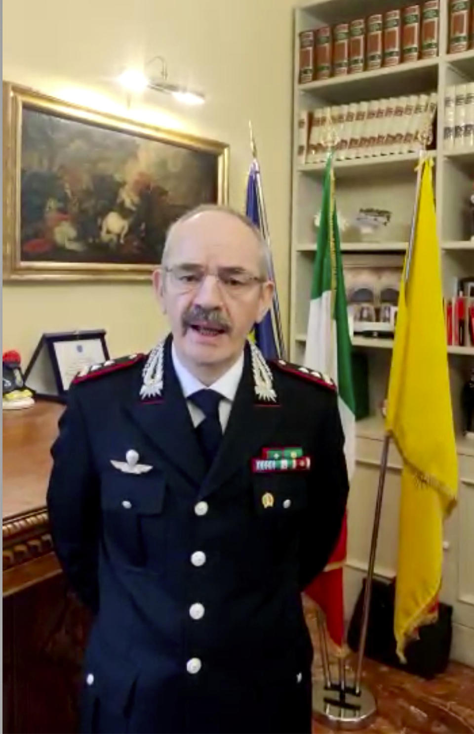 In this image taken from a video released by Italian Carabinieri on Monday, Jan. 16, 2023, Carabinieri Gen. Pasquale Angelosanto, who heads the police force's special operations squad (R.O.S.), announces the arrest of top Mafia boss Matteo Messina Denaro at a private clinic in Palermo, Sicily, after 30 years on the run, Monday, Jan. 16, 2023. (Carabinieri via AP)