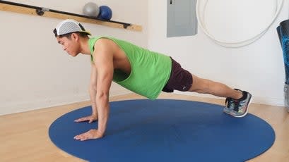 <span class="article__caption">Spiderman push-up <strong>step 1</strong>.</span> (Photo: Hayden Carpenter) <figure><figcaption><span class="article__caption">Spiderman push-up <strong>step 2</strong>.</span> (Photo: Hayden Carpenter)</figcaption></figure>