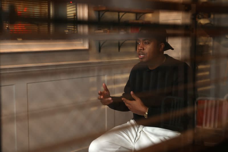 Rapper Nas is interviewed at Sweet Chick restaurant in Los Angeles