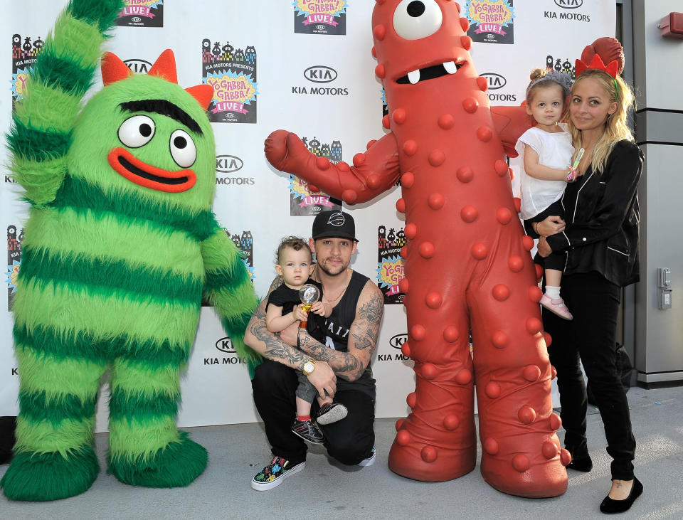 Nicole Richie and Joel Madden with son Sparrow Madden (L) and Harlow Madden pose with YO GABBA GABBA! characters at YO GABBA GABBA! @ KIA PRESENTS YO GABBA GABBA! LIVE! THERE'S A PARTY IN MY CITY produced by S2BN Entertainment in association with The Magic Store and W!LDBRAIN Entertainment at Nokia L.A. LIVE on November 27, 2010 in Los Angeles, California.