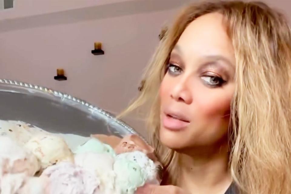 <p>Tyra Banks/Instagram</p> Tyra Banks licked ice cream off a silver platter to announce new SMiZE and Dream location