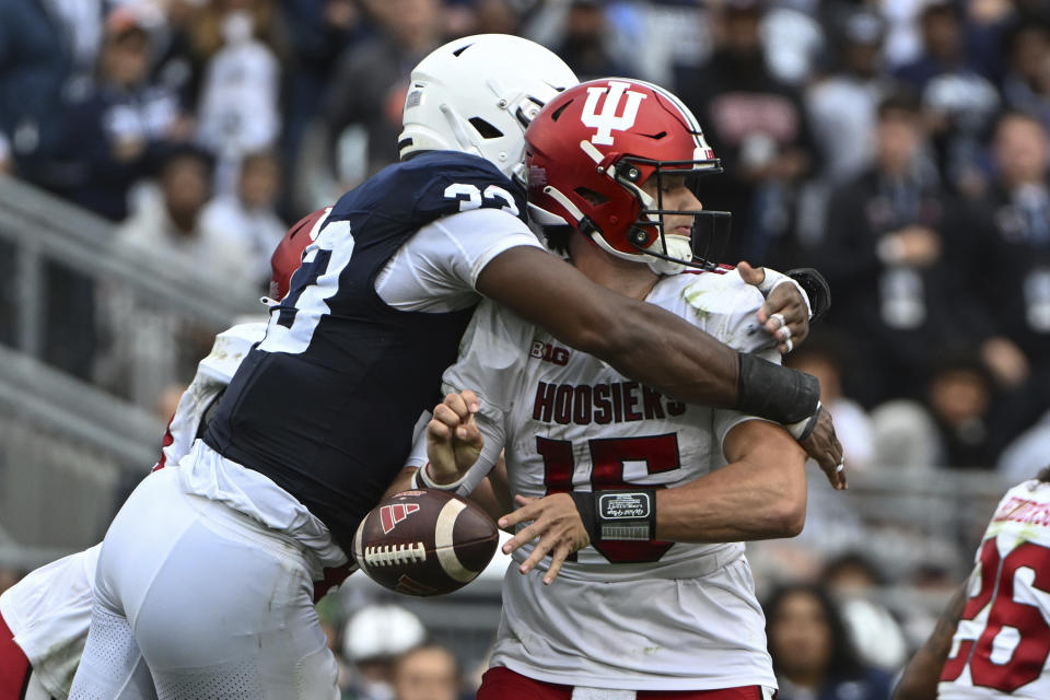 Penn State defensive end Dani Dennis-Sutton (33) sacks Indiana quarterback Brendan Sorsby (15) causing a fumble during the second half of an NCAA college football game, Saturday, Oct. 28, 2023, in State College, Pa. (AP Photo/Barry Reeger)