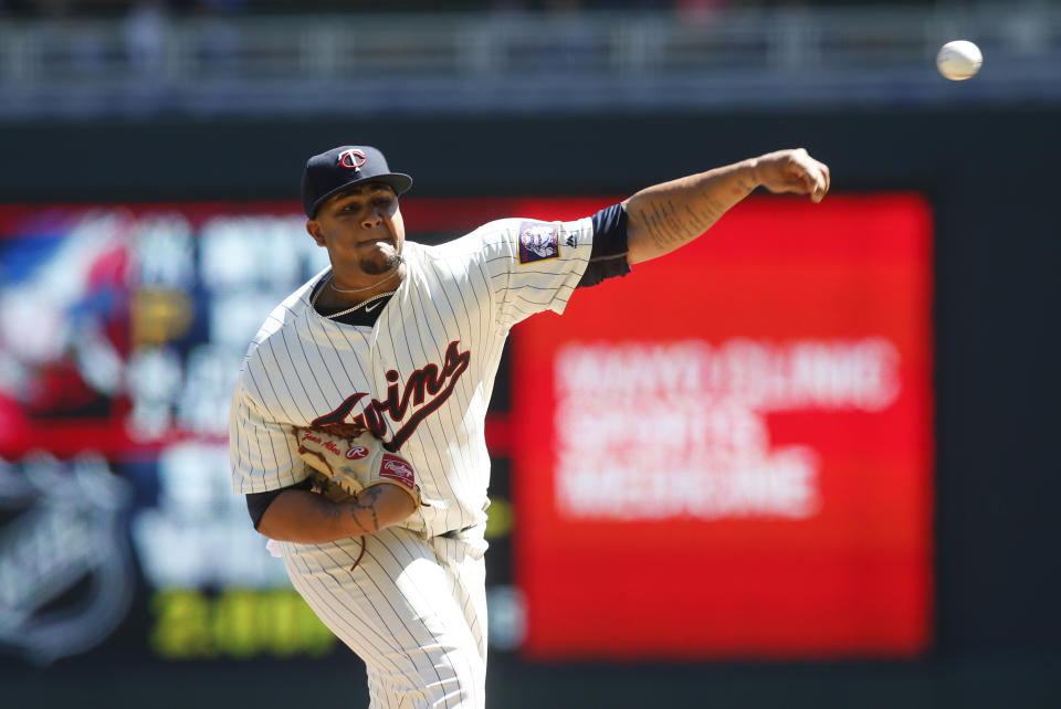 Minnesota Twins pitcher Adalberto Mejia throws against the Detroit Tigers in the first inning of a baseball game Saturday, April 22, 2017, in Minneapolis. (AP Photo/Jim Mone)