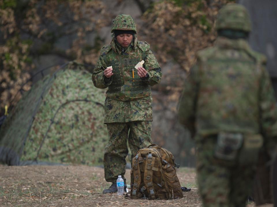 A troop of the Japan Ground Self-Defense Force eats during a break.