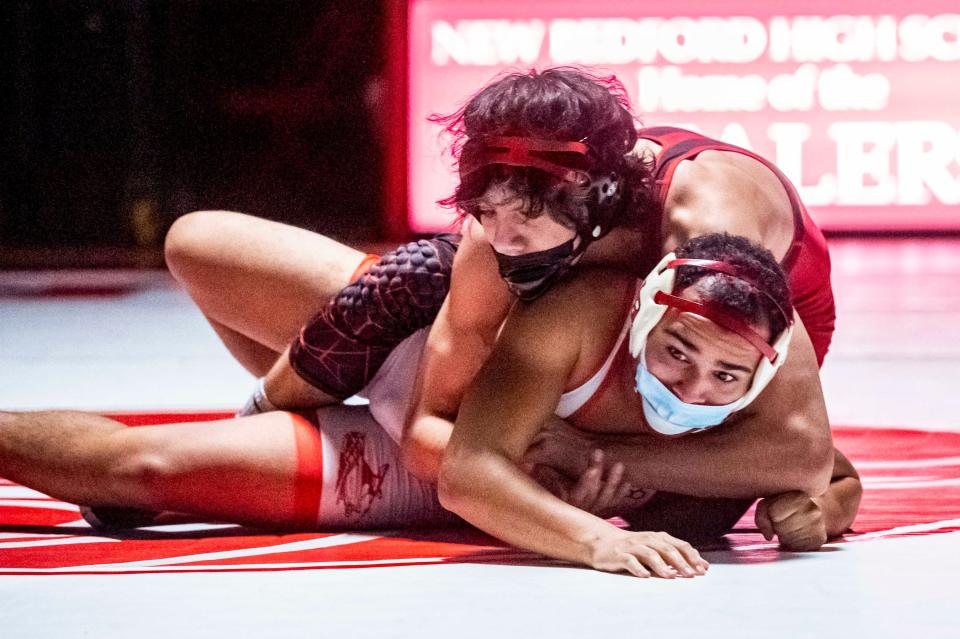 New Bedford's Tayel Guzman looks to break free from Brockton's Aman Khalil.