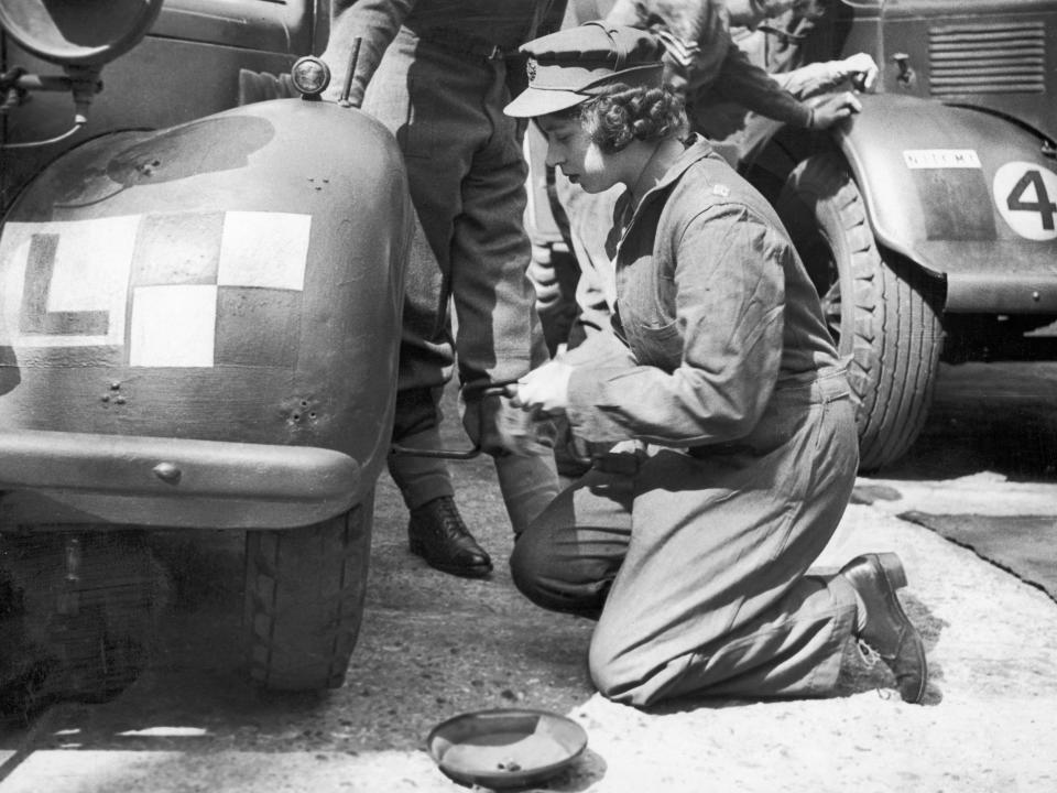 Queen Elizabeth learning car maintenance in 1945.