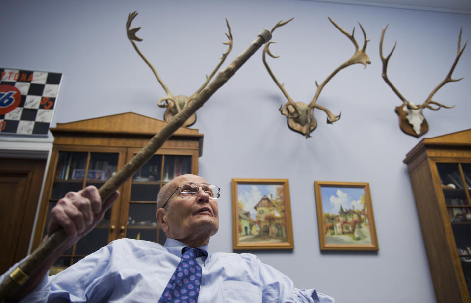 Dingell&nbsp;talks about the memorabilia in his congressional&nbsp;office in 2014. On the wall are caribou and elk antlers.