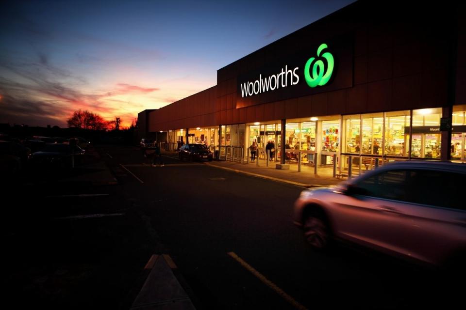 Woolworths store car park open at dusk