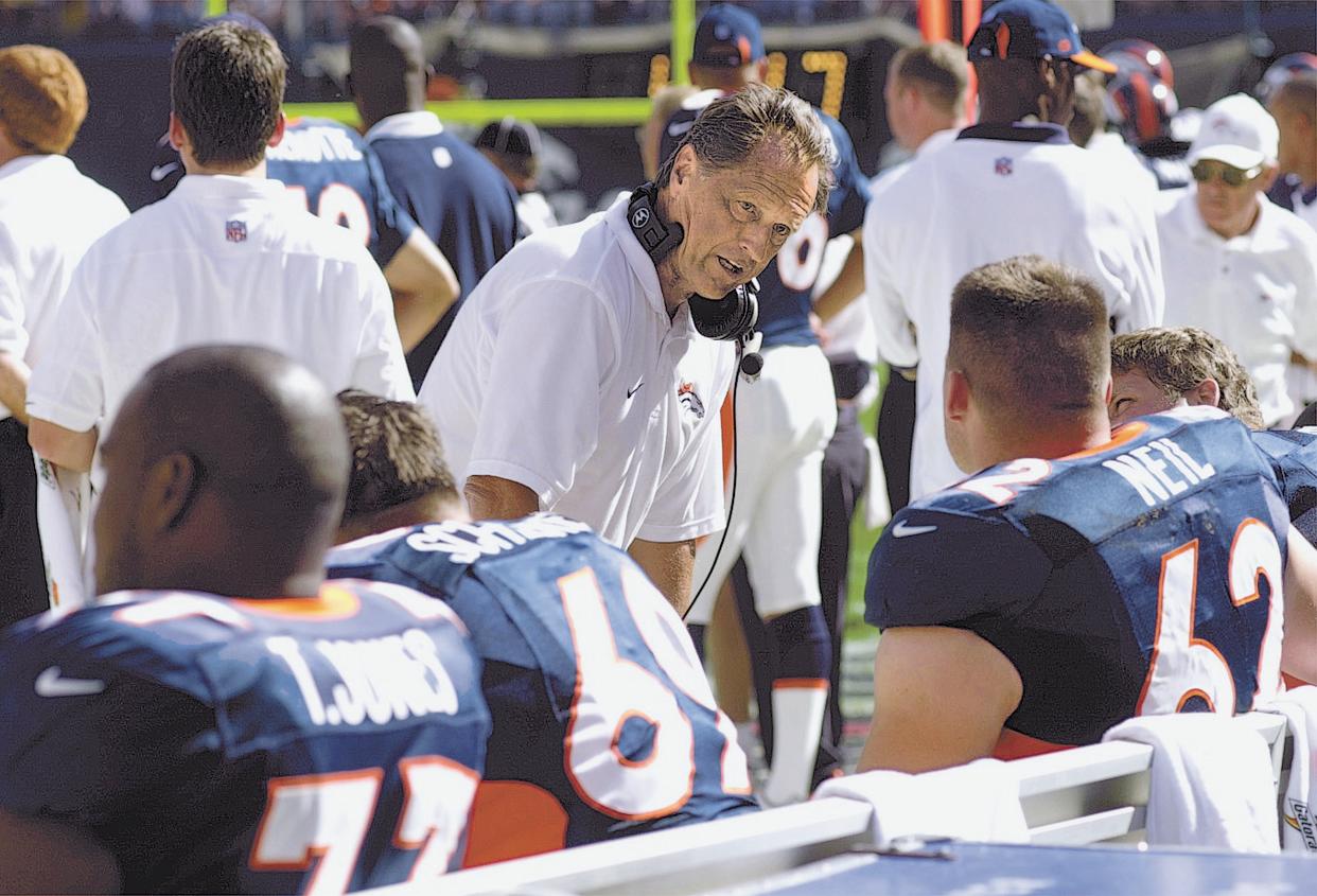 Denver Broncos offensive line coach Alex Gibbs talks to his line during a game in 2000. (Photo By John Leyba/The Denver Post via Getty Images)