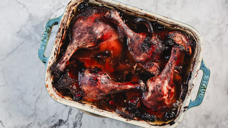 Baked duck legs in casserole dish